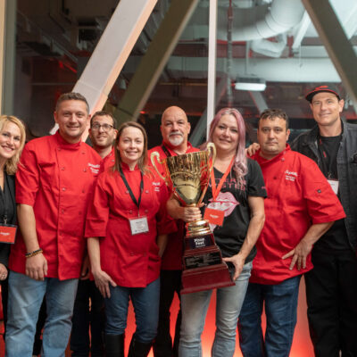 A winning team at the Gold pizza Competition