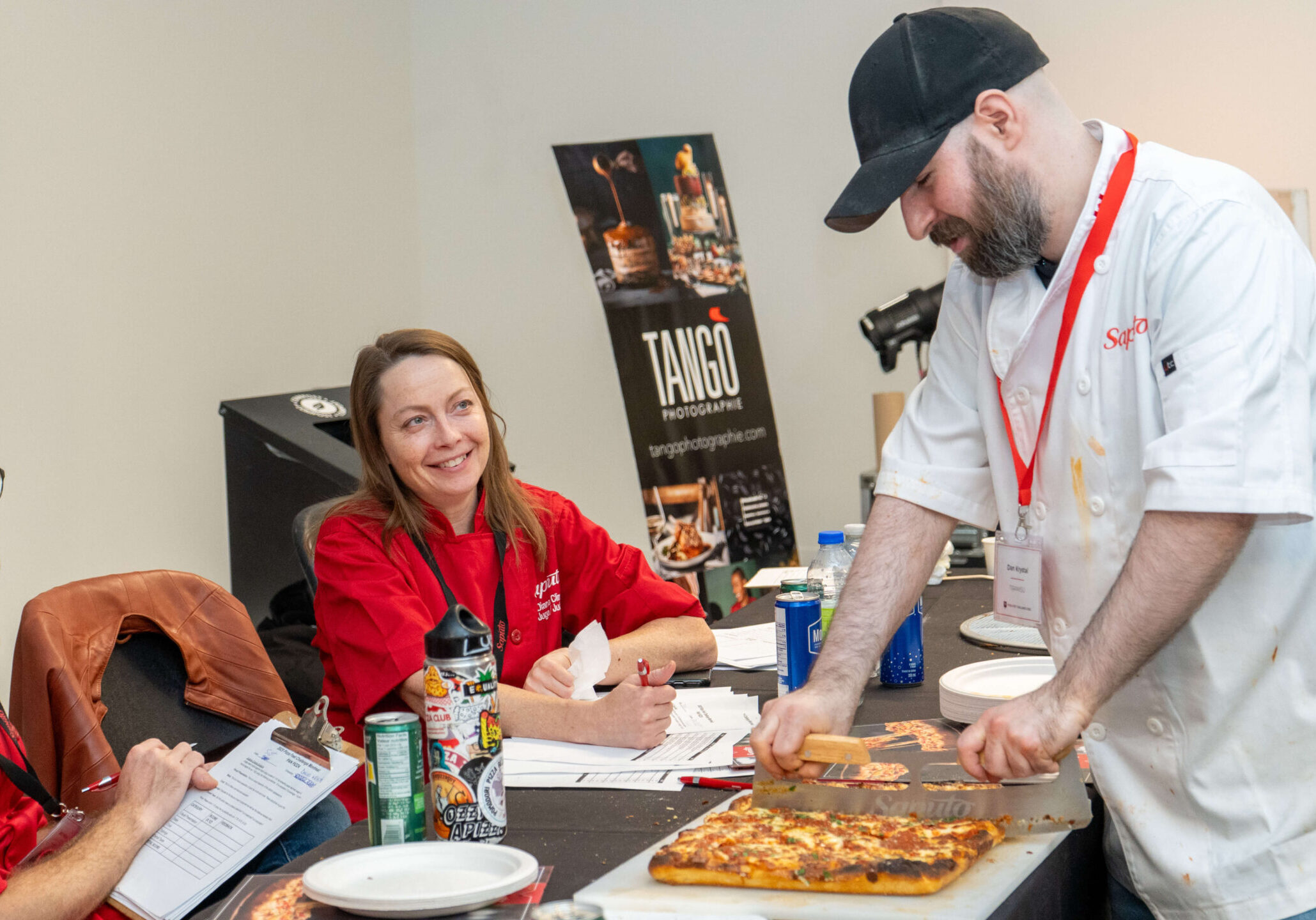 A panel of judges at the Gold Pizza Competition